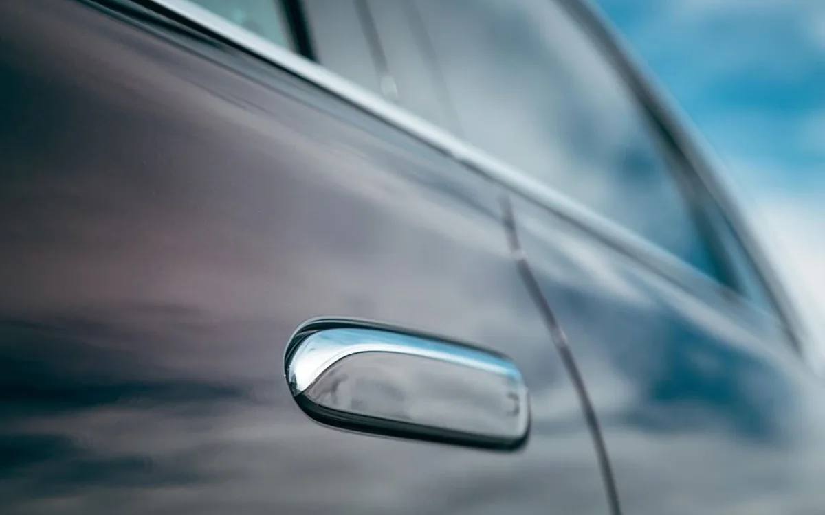 Door skin and handle — body repair at Alfa Garage Miami