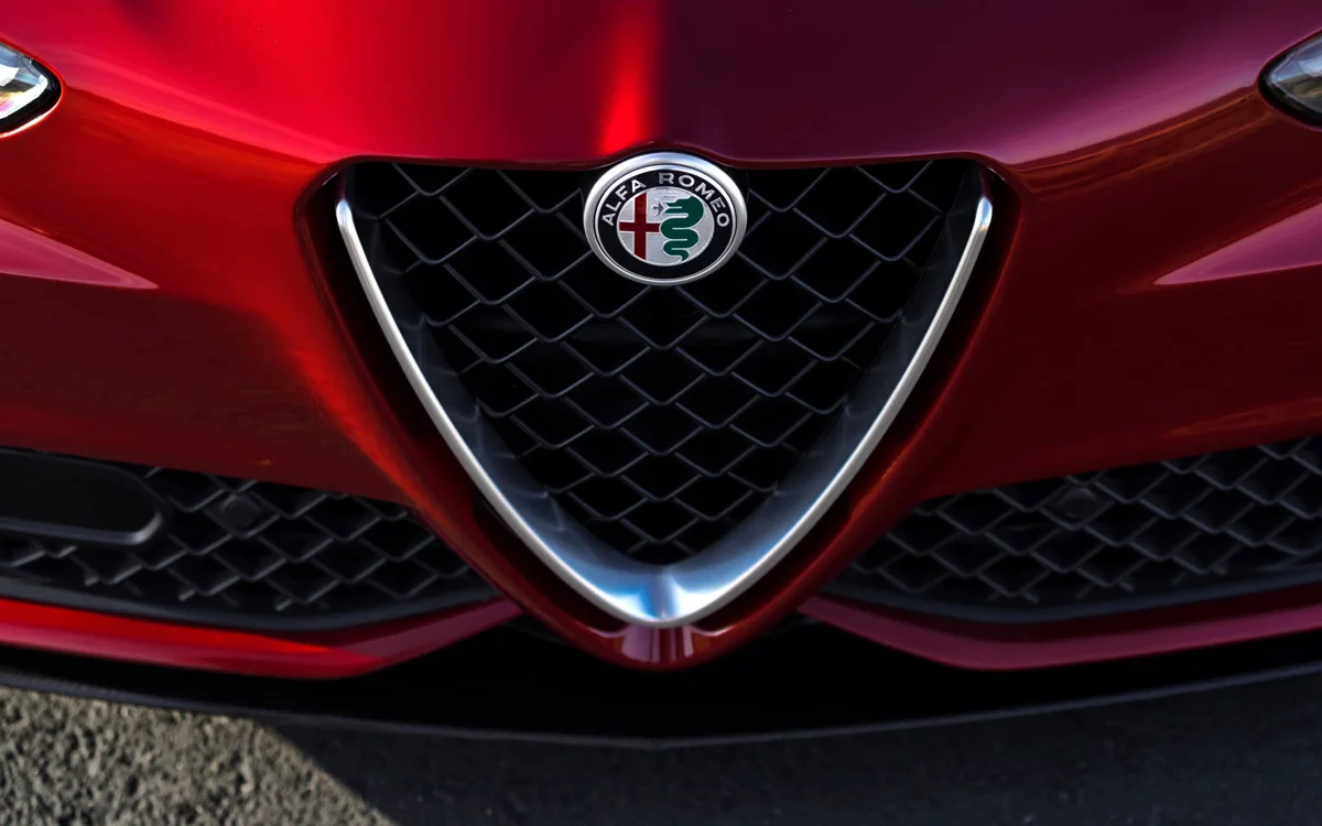Alfa Romeo grille and badge — genuine trim fitted at Alfa Garage Miami