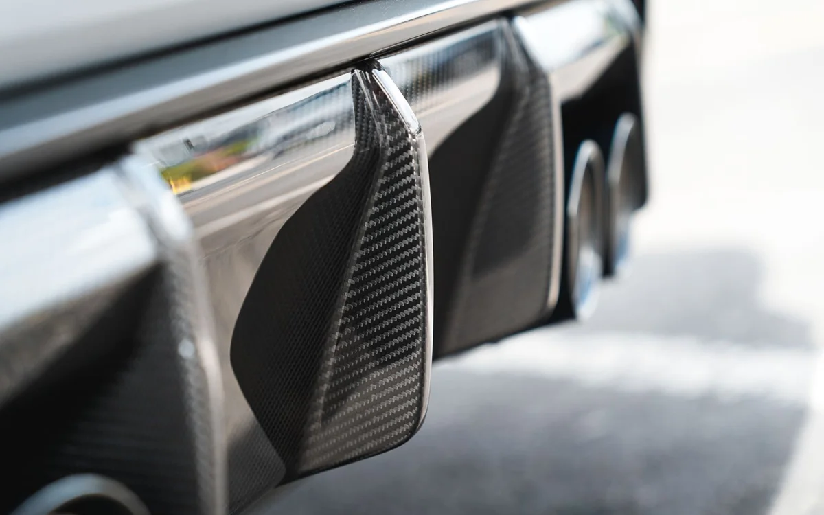 Rear bumper cover with carbon diffuser and parking sensors re-tested